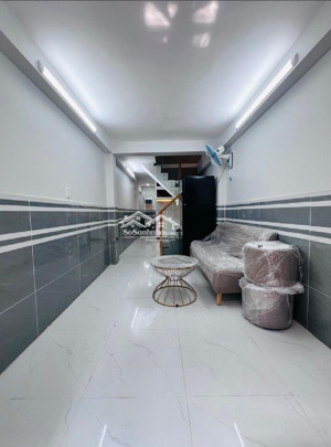 nhà mới q7- 3 tầng chỉ 2tỷ sở huử góc 2 mt kế mặt tiền htp