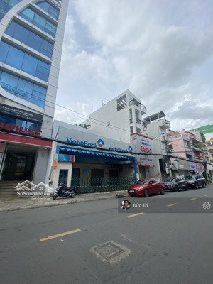 bán nhà mặt tiền lê quang định ngang 9m xd mới hầm 9 tầng đang cho thuê 80tr/th giá 70 tỷ