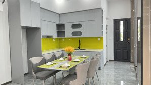 bán nhà 2 lầu 1 trệt mặt tiền đường nhựa 10m thông gần chợ dĩ an