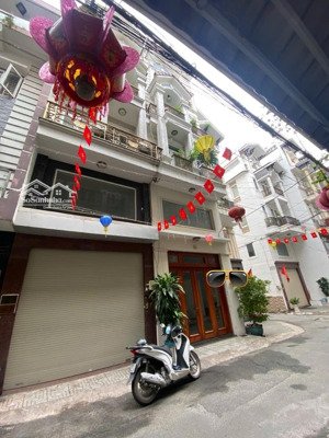 khu phân lô. nhà 5 tầng. 60m2(4x15). đường nhựa 6m. thông các hướng.