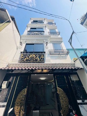 nhà mới xây 5 tầng 170m sàn ( đường số 26 p.03 q.gv )