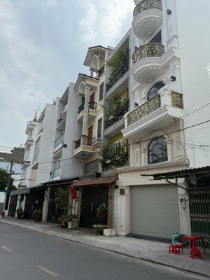 bán nhà hẻm 10m dương quảng hàm , 120m2 , dt : 4,4m x 28m , hẻm 2 xe tải