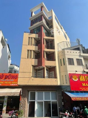 giảm 5 tỷ. bán gấp tòa nhà duy nhất mặt tiền đường cao thắng, quận 10(cũ). dt: 5.2x18m, 7 tầng.