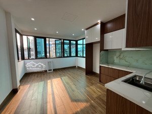 duy nhà bán nhà đẹp đê la thành, thang máy, mới kính koong, dòng tiền tốt, 50m mặt phố, 35mx7tầng