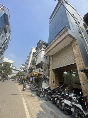 bán nhà sát mặt phố trần duy hưng, 8 tầng thang máy, thông sàn gara nhiều ô tô, kinh doanh đa dạng.