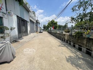 nhà 2 mặt tiền đẹp 95.4m² odt đường xe hơi tránh nhau ven kênh thoáng mát giá 7.5 tỷ