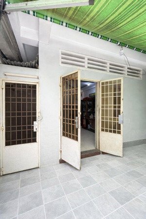 nhà ngang 5m nở hậu sát đường xe hơi trần bình trọng p.5 bình thạnh nhỉnh 5 tỉ tl