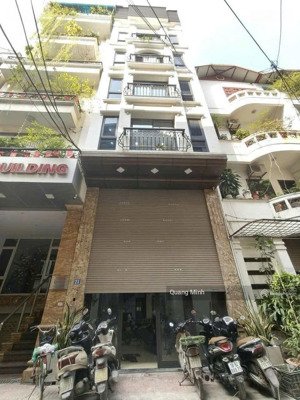 cho thuê tòa nhà 7 tầng ngõ 30 nguyễn thị định dt: 82m2 x 7 tầng mặt tiền 6m. thông sàn, thang máy