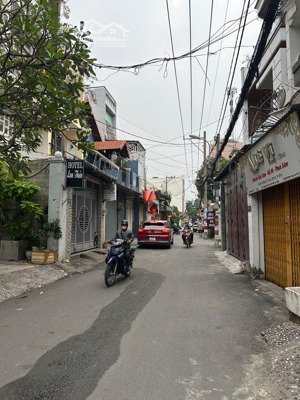 nhà mới ở ngay - mặt tiền hẻm xe hơi 6m - ngay emart - 6.5x11 - 4 tầng - kinh doanh đa ngành