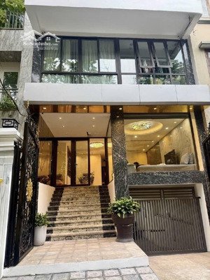 mặt phố nguyễn đổng chi - hàng xóm vin hàm nghi - nhà đẹp 6 tầng thang máy có hầm ở ngay