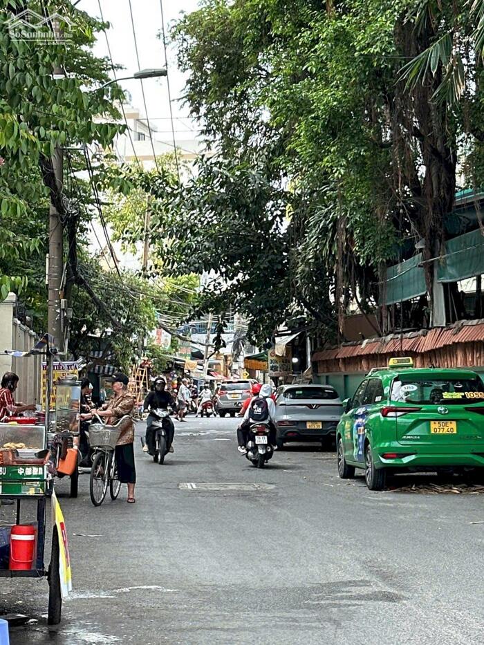 Hình ảnh Bán nhà 7 tầng đẹp hẻm 656 Quang Trung ngang 6m có hầm T.máy ở ngay gần chợ 24 tỷ. 0