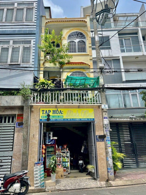 nhà 2lầu mặt tiền đường hiệp thành 13 , pht , quận 12