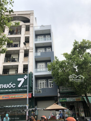 bán gấp mt hoàng hoa thám, p6, bt, 5m x21m cn 105m2, 7 tầng thang máy, giá 23,5 tỷ